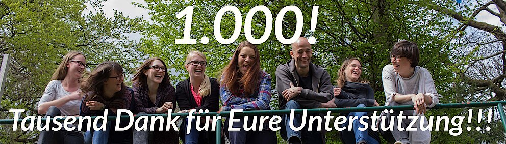 Gruppe Menschen und Text 1000 Dank für eure unterstützung